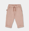 Pantaloni a quadri beige in maglia